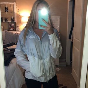 gray and white nike zip up windbreaker